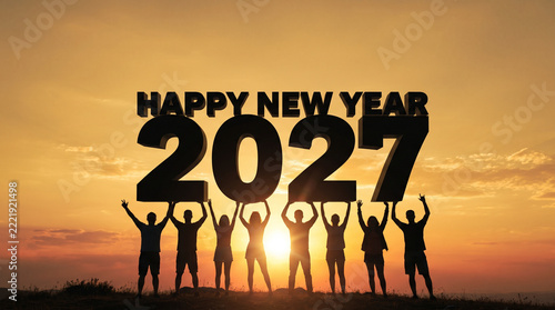 Happy New Year 2027 Silhouette of Celebrating People Holding Giant Numbers at Golden Sunset Sky with Copy Space
