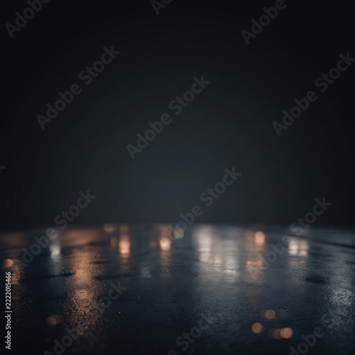 Dark, wet asphalt surface with blurred golden bokeh lights reflecting in the night rain