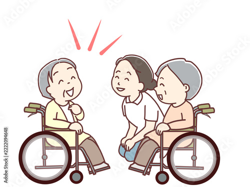介護、高齢者と楽しく会話をするスタッフ