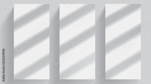 Three blank white vertical panels with diagonal shadow lines image photo