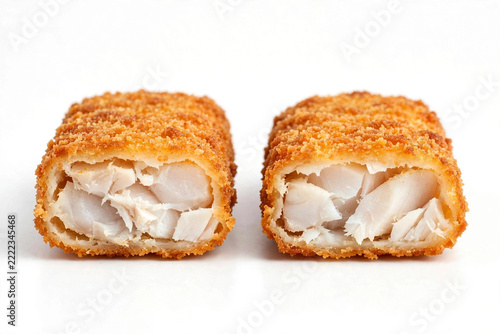 two fish fingers on white