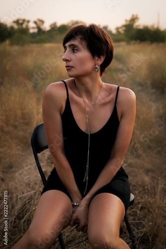 Beautiful Woman in a Rural Autumn Landscape at Sunset, Golden Hour Portrait and Countryside Lifestyle