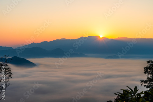 Sunrise over sea of clouds in Zhejiang mountains, peaceful nature and travel landscape