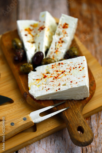 Feta cheese with olives and spices