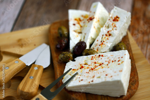 Feta cheese with olives and spices