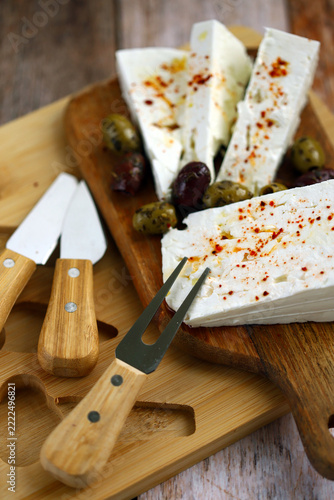 Feta cheese with olives and spices