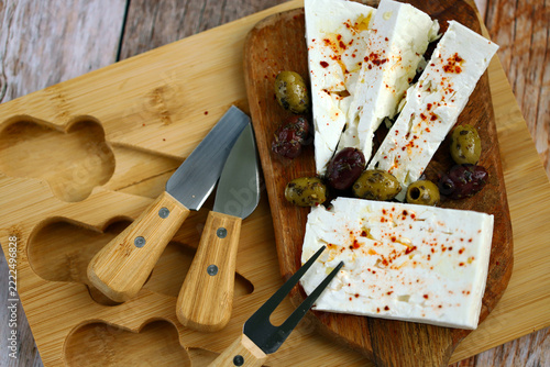 Feta cheese with olives and spices