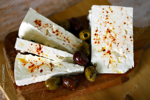 Feta cheese with olives and spices