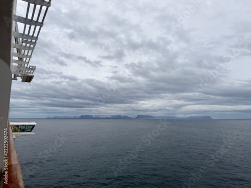 Approaching Iceland Coast Across Open Ocean Under Gray Sky