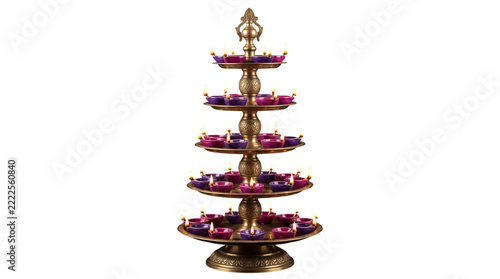 Traditional brass tiered diya lamp stand isolated on transparent background