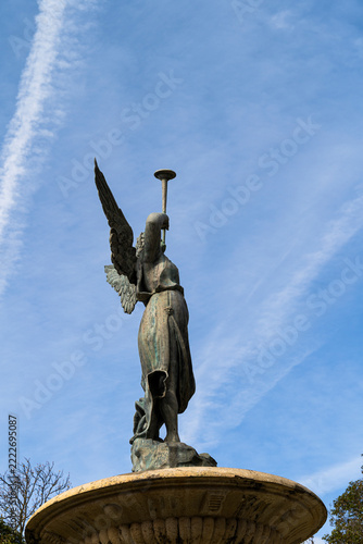 Statue against a blue sky in a park in Valladolid