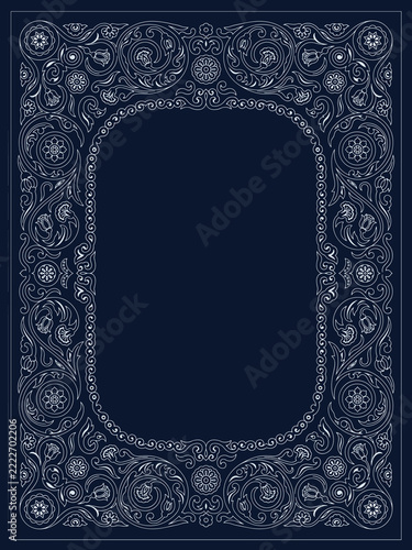 Vintage ornate floral frame on dark blue background