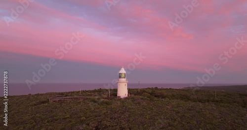 Cape Naturaliste Lighthouse at pink sunset, aerial drone view, Western Australia