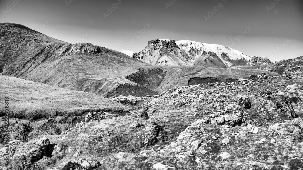 Fototapeta premium Sunny day in Landmannalaugar Iceland showcasing vibrant landscape, mountains, and wilderness