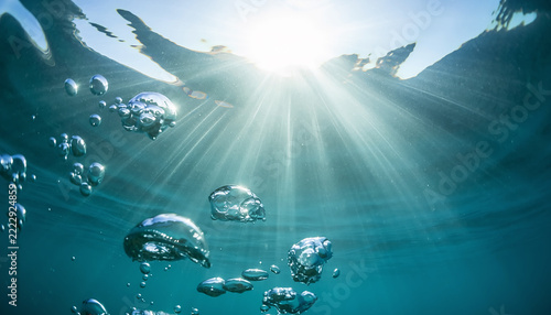 Underwater Sun Rays and Rising Bubbles Generative AI