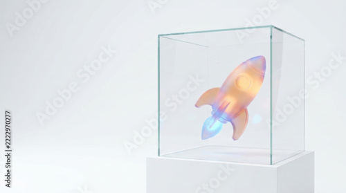 Rocket model inside transparent glass cube on white pedestal suggests innovation and protection while inspiring colorful discoveries