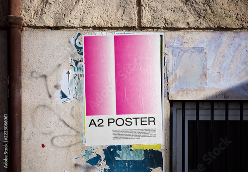 Mockup Of Customizable A2 Poster On Rome Street Wall