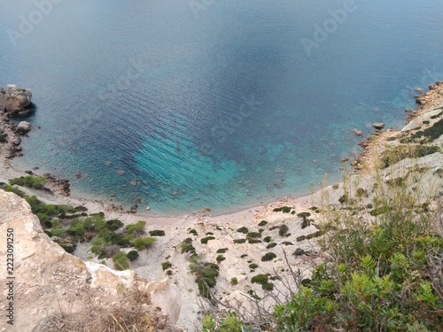 Balearic Islands Spain Cove Mediterranean Coast Turquoise Water Travel Nature Landscape. High angle view of a secluded rocky cove in the Balearic Islands