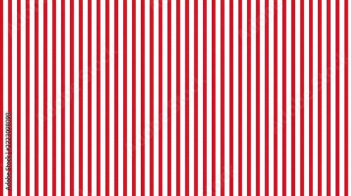Dense red vertical stripe seamless pattern on white background for wallpaper textile and surface design suitable for packaging banners and festive decor