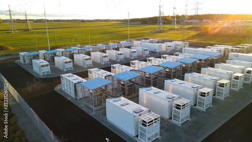 Obraz na plátně Large battery energy storage park with rows of containerized BESS units and near