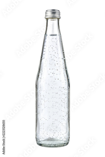 Obraz na plátně Clear glass bottle filled with sparkling water and a silver cap, captured with b