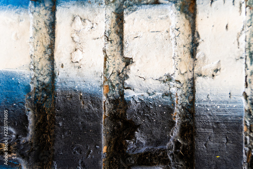 Weathered abstract textured surface with layered paint
