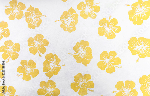 Yellow hibiscus pattern flower on white paper background, paper with yellow flower pattern background