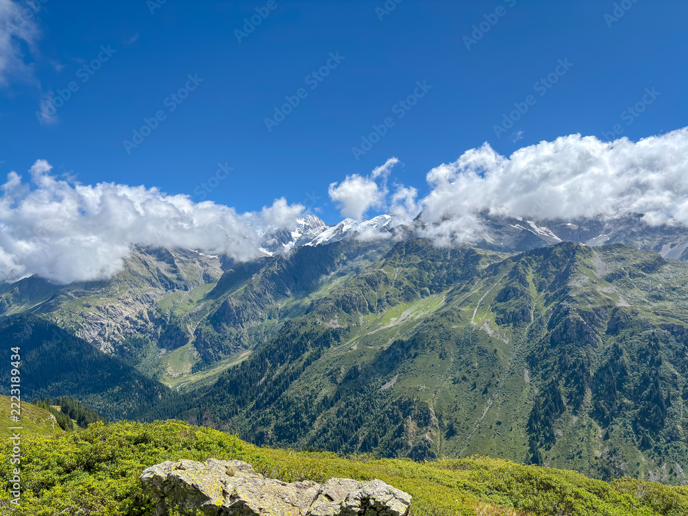Fototapeta premium Clear summer view of Mont Blanc from alpine slopes, France