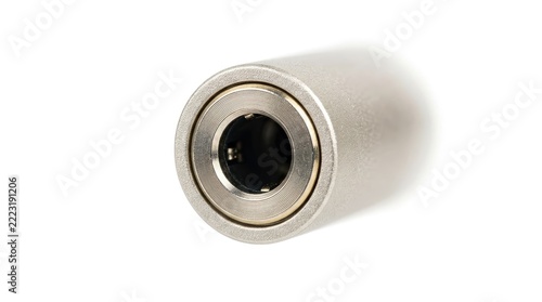 Silver metallic audio jack adapter for connecting sound equipment close-up view
