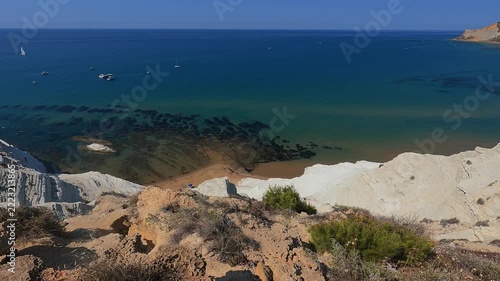 mediterranean beach scene with clear water at Scala dei Turchi, Sicily