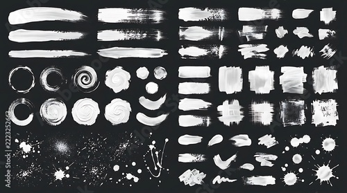 Collection of white paint brush strokes, textures, and splatters on black background for artistic and graphic design purposes.