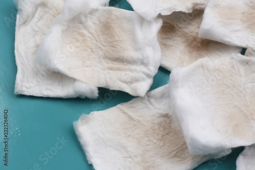 Dirty cotton pads after removing facial makeup