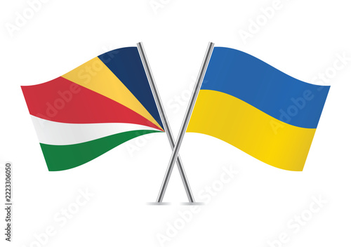 Seychelles and Ukraine crossed flags on a white background. Vector illustration.
