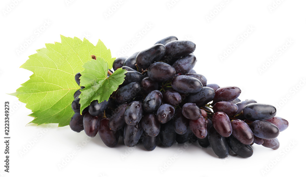 Fototapeta premium Bunch of fresh ripe grapes with green leaves isolated on white