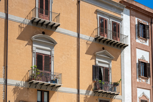 Facade of a building seen from the street in Palermo, Sicily, Italy 