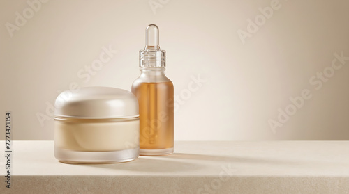 Moisturizer serum combo with glass dropper bottle and face cream jar on minimalist beige background banner