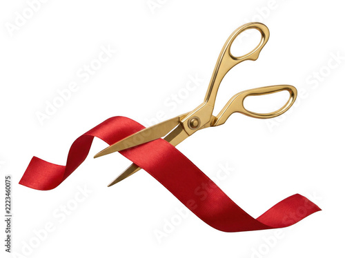 A pair of gold scissors cutting through a red ribbon on transparent background