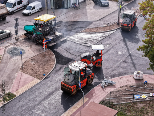 Road Construction with Asphalt Rollers in a Residential Area
