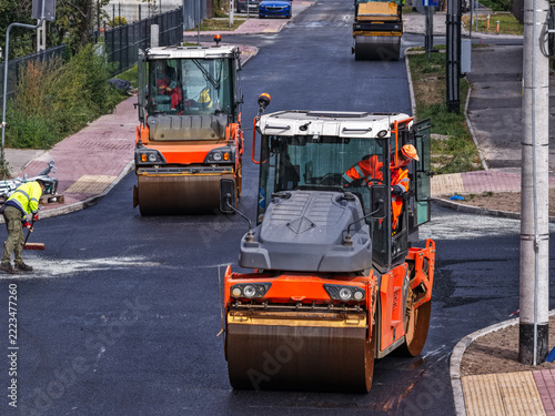 Road Construction with Asphalt Rollers in a Residential Area