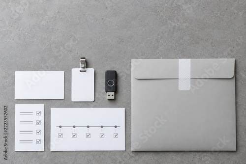Sealed evidence package with ID badge, security key and audit checklist for access revocation