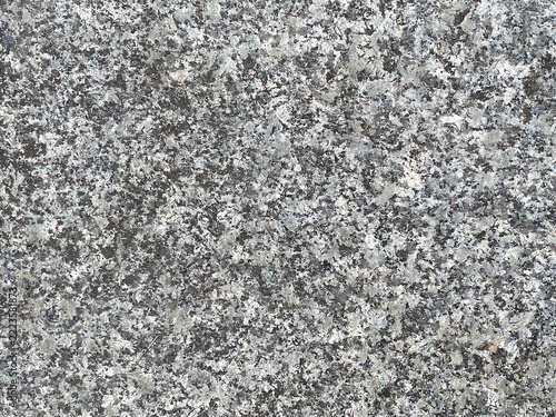 Detailed texture of grey stone and granite surface with mineral pattern