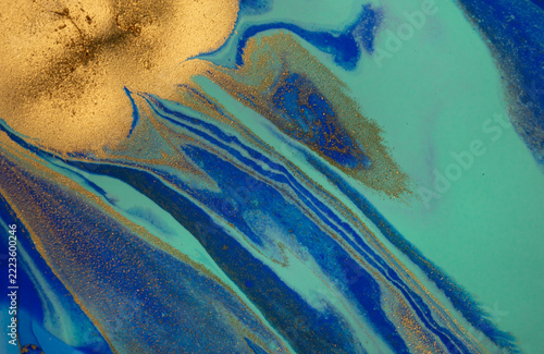 Abstract wave blue and gold marble background. Original Hand-drawn artwork made with ink on paper