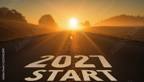 Road to 2027 start with sunrise on asphalt highway