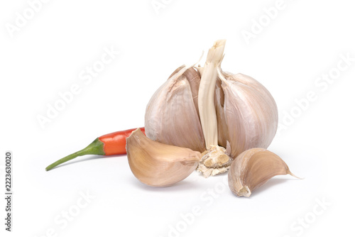 Garlic bulb cloves and red chili pepper on white background