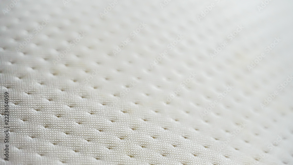 Fototapeta premium Close up detail of white textured mattress cover fabric background