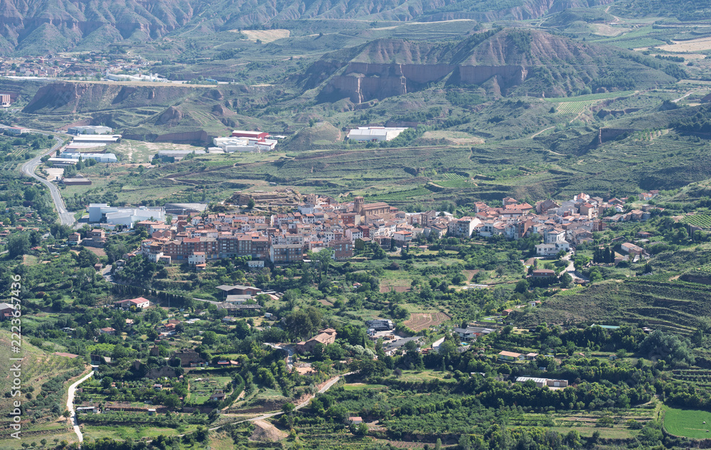 Fototapeta premium Rural Town Among Eroded Hills in La Rioja