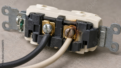Loose Electrical Outlet Terminal With Heat Discoloration Close Up