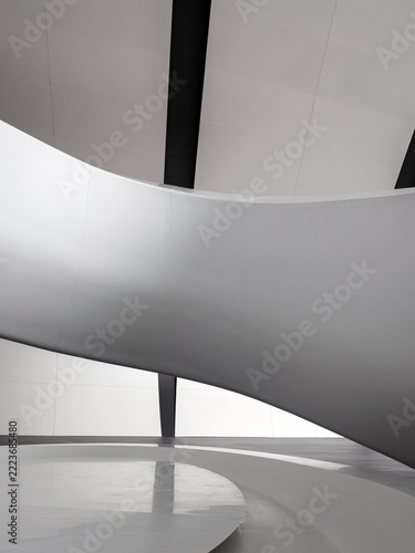 A fragment of the interior with a spiral‑shaped snow‑white ramp