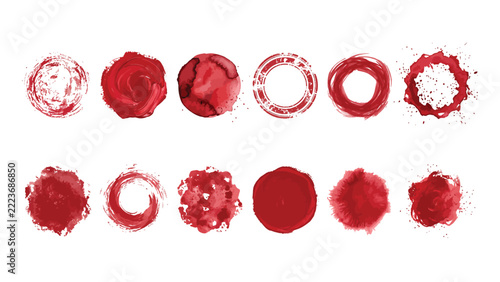 Red watercolor circles and stamps, abstract brush strokes and ink splatters