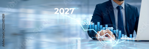 Corporate Businessman Analyzing 2024 2025 2026 to 2027 Economic Trends and Growth Strategy on Laptop